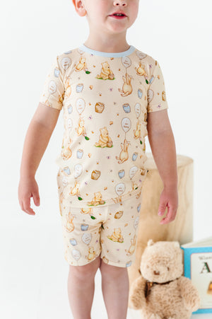 Shop The Sleepy Sloth 100 Acres of Kindness Winnie the Pooh Two Piece Jammies Pajamas with Shorts at Purple Owl Boutique
