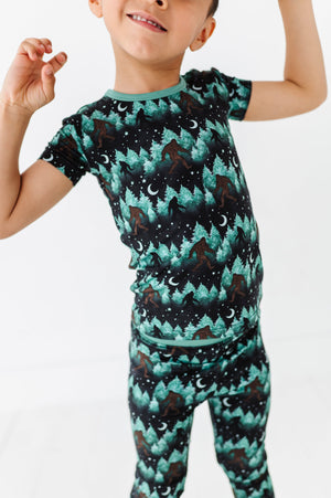 Shop The Sleepy Sloth Gone Squachin' Big Foot Print Two Piece Jammies Pajamas at Purple Owl Boutique
